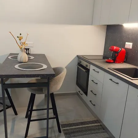 Omicron Apartament *